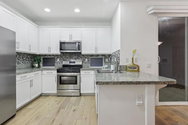 Interior, Kitchen, Recessed Lighting, Stainless Steel Appliances, Wood Texture Flooring