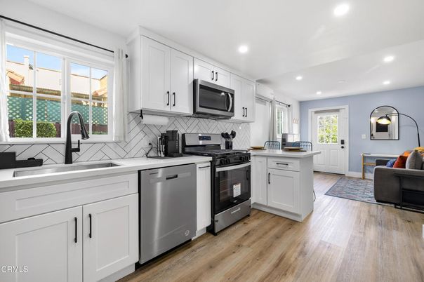 Interior, Kitchen, Recessed Lighting, Stainless Steel Appliances, Wood Texture Flooring