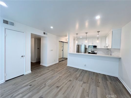 Interior, Kitchen, Pendant Lights, Recessed Lighting, Stainless Steel Appliances, Wood Texture Flooring