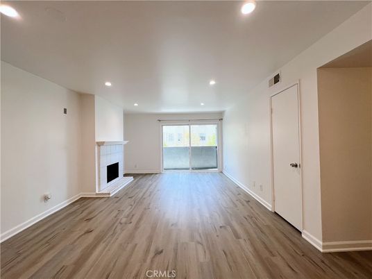 Empty room, Fireplace, Interior, Recessed Lighting, Wood Texture Flooring