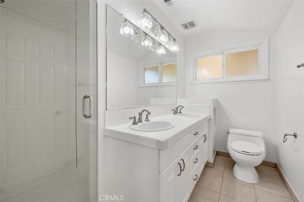 Bathroom, Dual Sink Vanities, Glass Shower, Interior, Tile Countertops