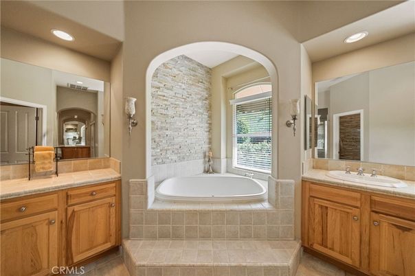 Bathroom, Dual Sink Vanities, Interior, Recessed Lighting, Tile Countertops