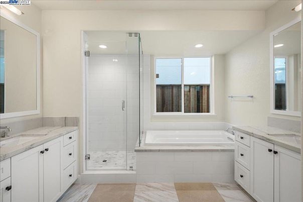 Bathroom, Dual Sink Vanities, Glass Shower, Interior, Marble, Recessed Lighting