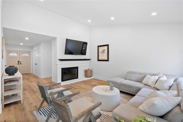 Fireplace, Interior, Living room, Recessed Lighting, Wood Texture Flooring