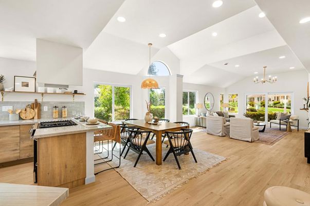 Chandelier, Dining room, Interior, Kitchen, Living room, Pendant Lights, Recessed Lighting, Stainless Steel Appliances, Wood Texture Flooring