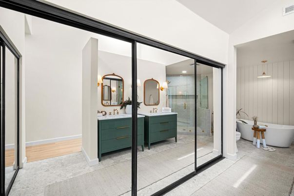 Bathroom, Dual Sink Vanities, Free Standing Baths, Glass Shower, Interior, Pendant Lights, Wood Texture Flooring
