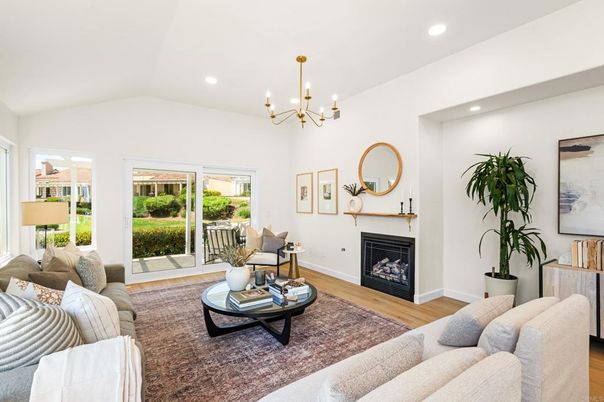 Chandelier, Fireplace, Interior, Living room, Recessed Lighting, Wood Texture Flooring
