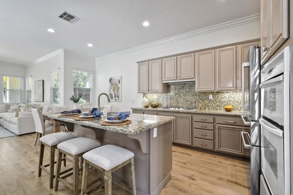Dining room, Interior, Kitchen, Living room, Recessed Lighting, Stainless Steel Appliances, Wood Texture Flooring