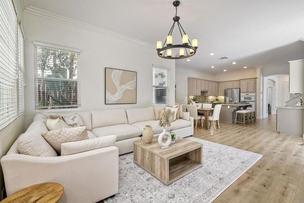 Chandelier, Dining room, Interior, Kitchen, Living room, Recessed Lighting, Stainless Steel Appliances, Wood Texture Flooring