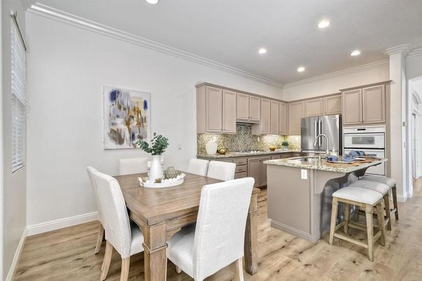 Dining room, Interior, Kitchen, Recessed Lighting, Stainless Steel Appliances, Wood Texture Flooring