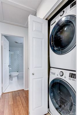 Bathroom, Interior, Utility Closets, Washer, Wood Texture Flooring