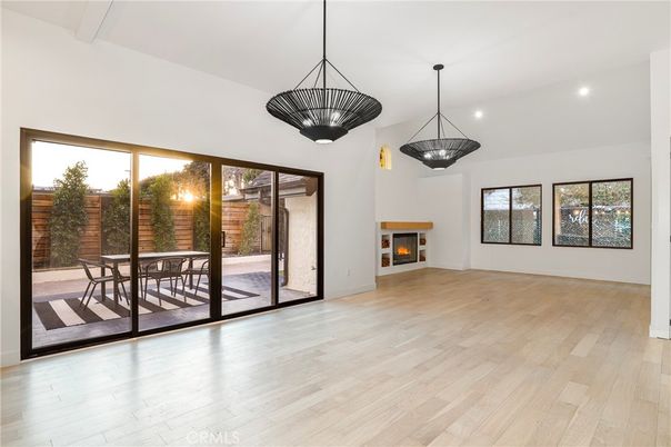 Fireplace, Interior, Pendant Lights, Recessed Lighting, Wood Texture Flooring