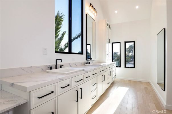 Bathroom, Dual Sink Vanities, Interior, Recessed Lighting, Wood Texture Flooring
