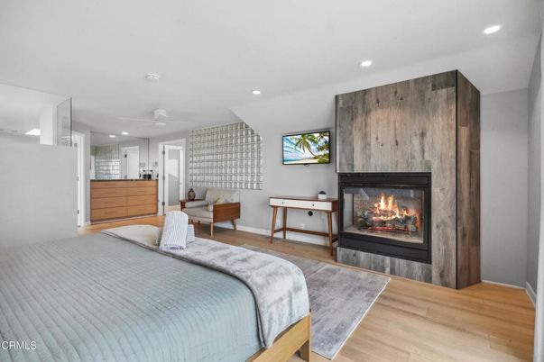 Bedroom, Fireplace, Interior, Recessed Lighting, Wood Texture Flooring