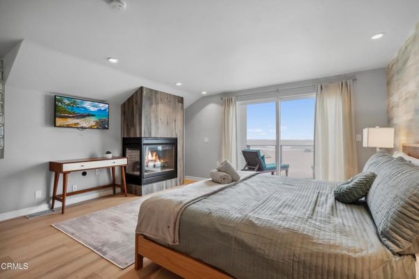 Bedroom, Fireplace, Interior, Recessed Lighting, Wood Texture Flooring
