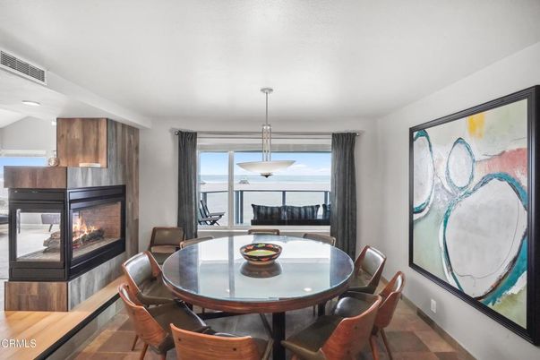 Dining room, Fireplace, Interior, Pendant Lights, Wood Texture Flooring