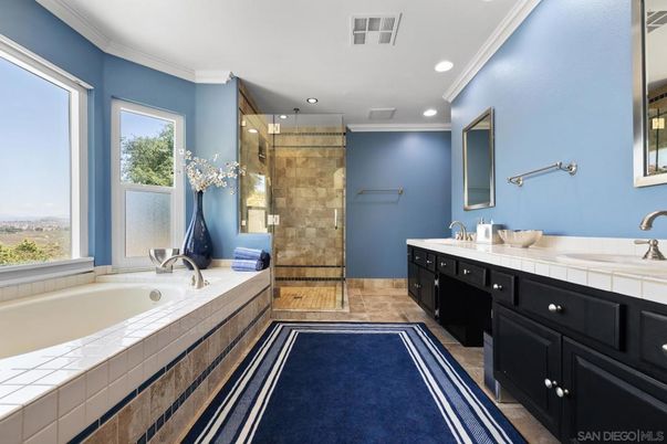 Bathroom, Dual Sink Vanities, Glass Shower, Interior, Recessed Lighting, Tile Countertops