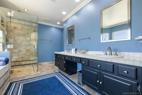 Bathroom, Dual Sink Vanities, Glass Shower, Interior, Recessed Lighting, Tile Countertops