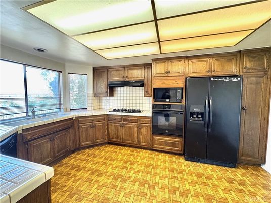 Interior, Kitchen, Tile Countertops, Wood Texture Flooring