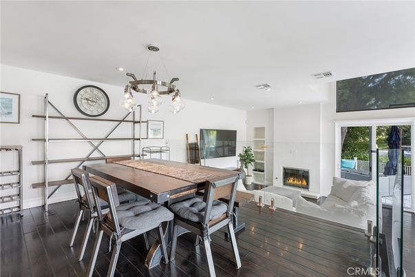 Dining room, Fireplace, Interior, Pendant Lights, Recessed Lighting, Wood Texture Flooring