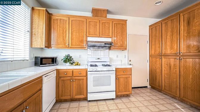 Interior, Kitchen, Recessed Lighting, Tile Countertops