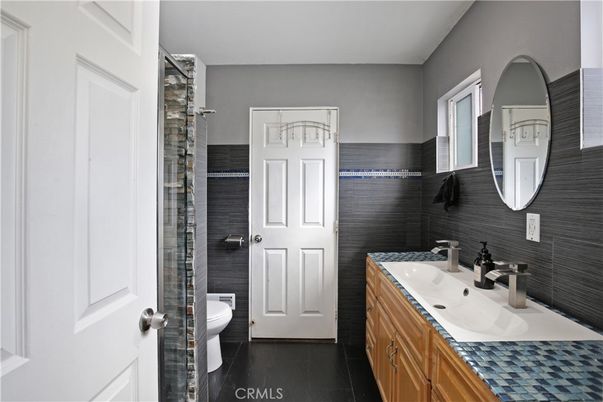 Bathroom, Dual Sink Vanities, Interior, Tile Countertops, Wood Texture Flooring