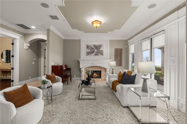 Fireplace, Interior, Living room, Piano, Recessed Lighting, Wood Texture Flooring