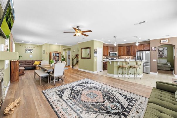 Dining room, Interior, Kitchen, Living room, Recessed Lighting, Stainless Steel Appliances, Wood Texture Flooring