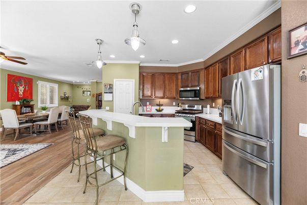Dining room, Interior, Kitchen, Pendant Lights, Recessed Lighting, Stainless Steel Appliances, Wood Texture Flooring