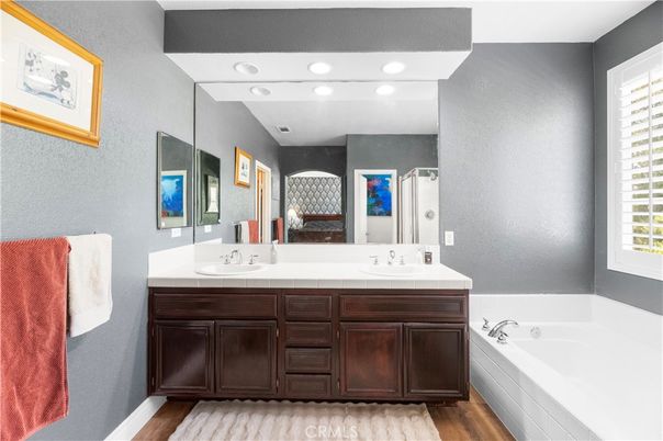 Bathroom, Dual Sink Vanities, Interior, Recessed Lighting, Wood Texture Flooring