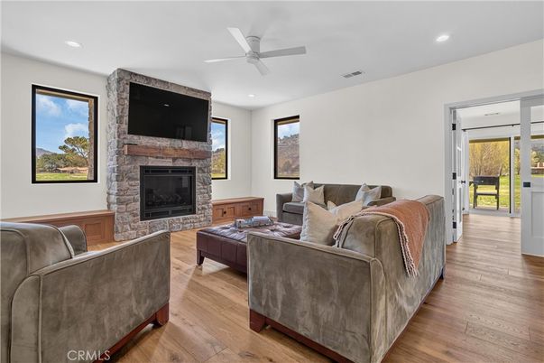 Fireplace, Interior, Living room, Recessed Lighting, Wood Texture Flooring