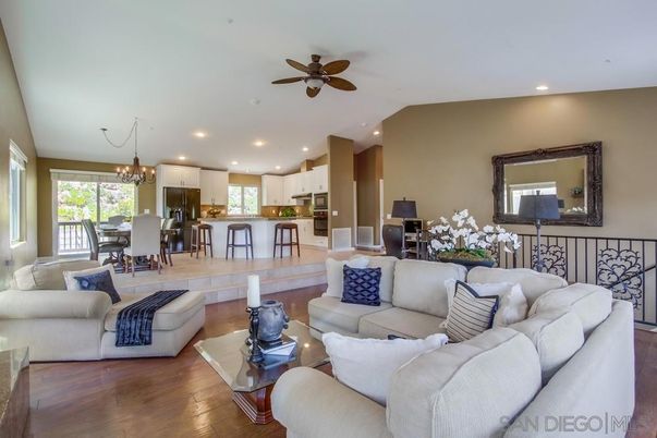 Chandelier, Dining room, Interior, Kitchen, Living room, Recessed Lighting, Stainless Steel Appliances, Wood Texture Flooring