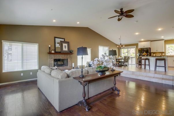 Chandelier, Dining room, Fireplace, Interior, Kitchen, Living room, Pendant Lights, Recessed Lighting, Wood Texture Flooring