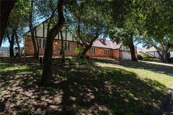 Attached, Exterior, Facade, Brick Facade, Tudor Revival