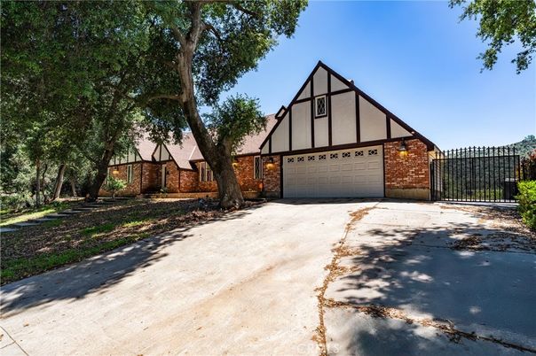 Attached, Exterior, Facade, Brick Facade, Tudor Revival