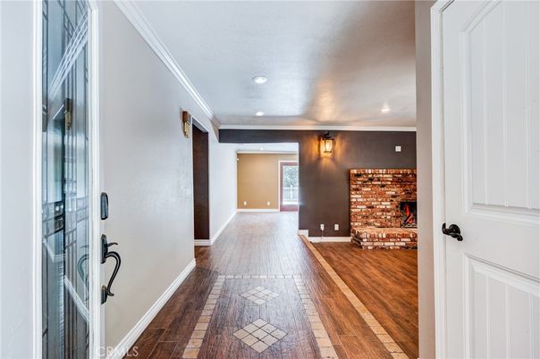 Fireplace, Interior, Recessed Lighting, Stone Walls, Wood Texture Flooring