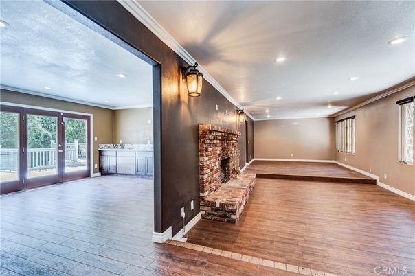 Empty room, Fireplace, Interior, Recessed Lighting, Wood Texture Flooring