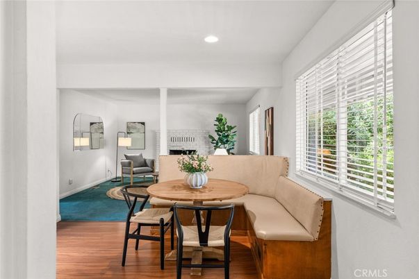 Dining room, Fireplace, Interior, Living room, Recessed Lighting, Wood Texture Flooring