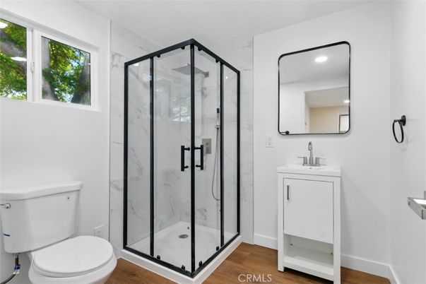 Bathroom, Glass Shower, Interior, Marble Walls, Recessed Lighting, Wood Texture Flooring