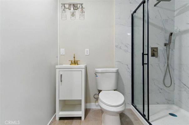 Bathroom, Glass Shower, Interior, Marble Walls, Wood Texture Flooring