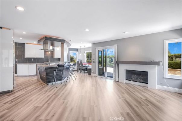 Dining room, Fireplace, Interior, Kitchen, Pendant Lights, Recessed Lighting, Wood Texture Flooring