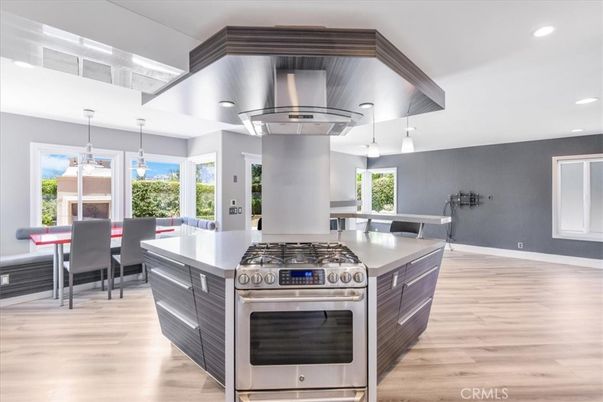 Dining room, Interior, Kitchen, Pendant Lights, Recessed Lighting, Stainless Steel Appliances, Wood Texture Flooring