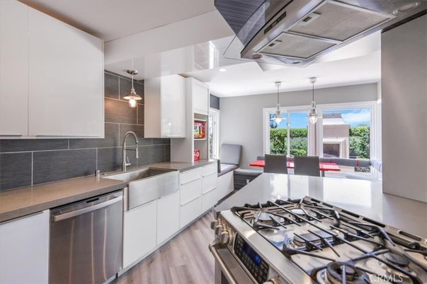 Dining room, Interior, Kitchen, Pendant Lights, Stainless Steel Appliances, Wood Texture Flooring