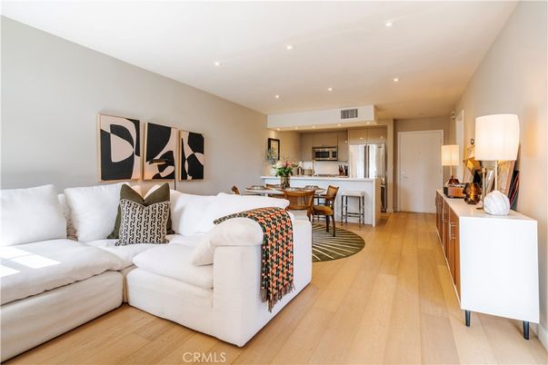 Dining room, Interior, Kitchen, Living room, Recessed Lighting, Stainless Steel Appliances, Wood Texture Flooring