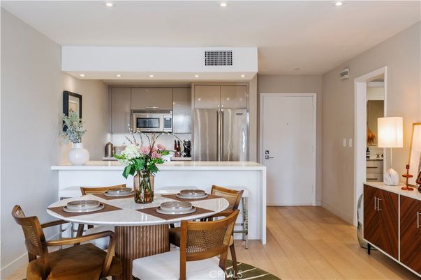 Dining room, Interior, Kitchen, Recessed Lighting, Stainless Steel Appliances, Wood Texture Flooring