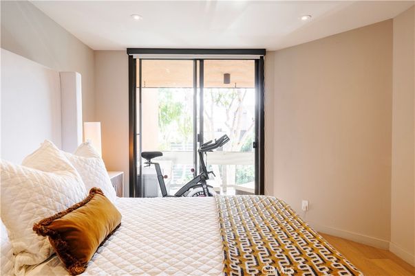 Bedroom, Fitness Equipment, Interior, Recessed Lighting, Wood Texture Flooring