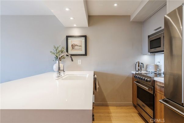 Interior, Kitchen, Recessed Lighting, Stainless Steel Appliances, Wood Texture Flooring