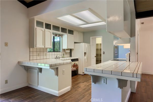Interior, Kitchen, Tile Countertops, Wood Texture Flooring