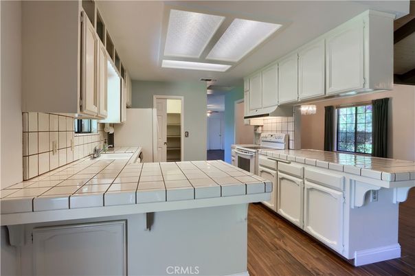 Interior, Kitchen, Tile Countertops, Wood Texture Flooring
