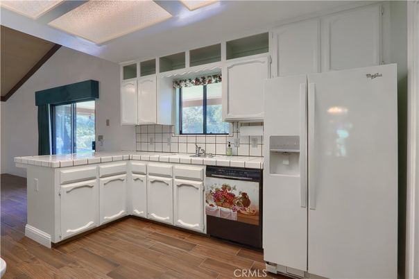 Interior, Kitchen, Tile Countertops, Wood Texture Flooring